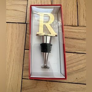 Monogram “R” wine stopper. NWT.